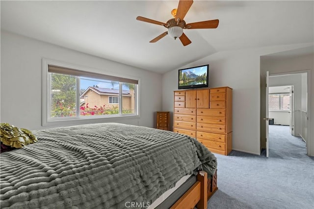 21643 Spice Ct, Saugus, CA 91350 - carpeted bedroom with lofted ceiling, multiple windows, and a ceiling fan