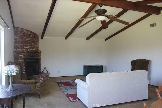 living area featuring carpet, visible vents, vaulted ceiling with beams, and a ceiling fan