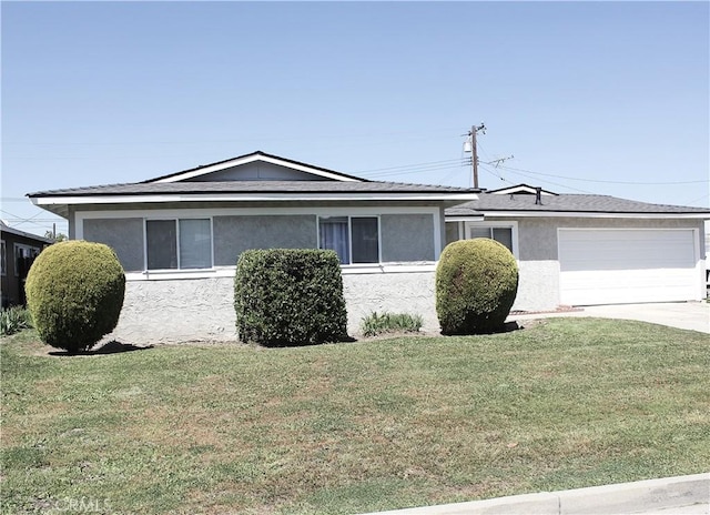 single story home featuring a garage, driveway, a front lawn, and stucco siding