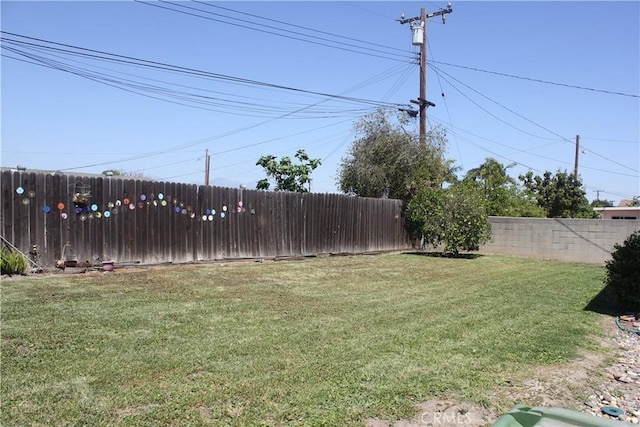 view of yard featuring fence private yard