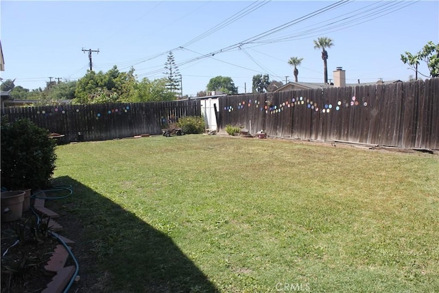 view of yard featuring a fenced backyard