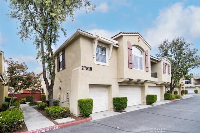 27518 Hazelhurst St Unit 1, Murrieta, CA 92562 - multi unit property with stucco siding and an attached garage