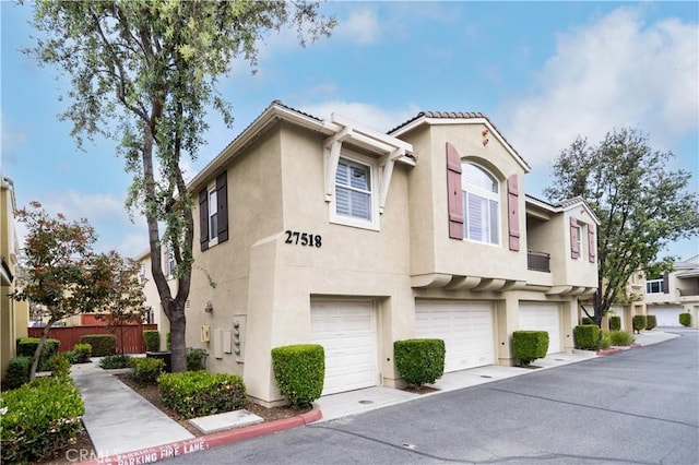 27518 Hazelhurst St Unit 1, Murrieta, CA 92562 - townhome / multi-family property featuring stucco siding and an attached garage