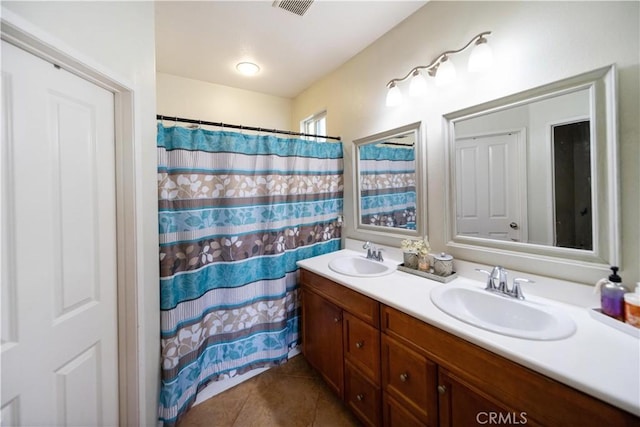 27518 Hazelhurst St Unit 1, Murrieta, CA 92562 - full bathroom featuring double vanity, tile patterned floors, and a shower with curtain
