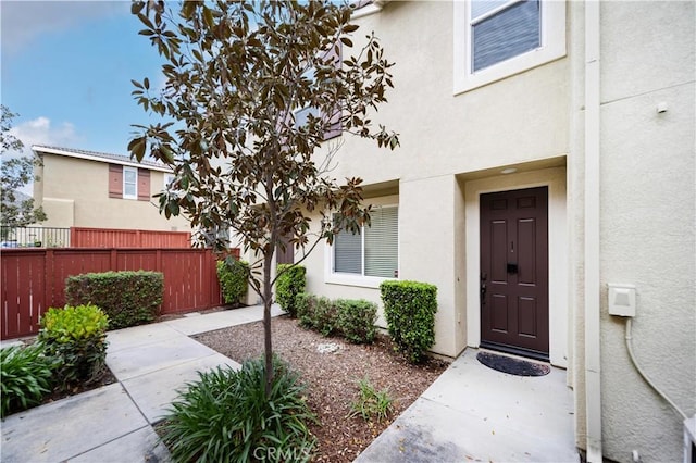 27518 Hazelhurst St Unit 1, Murrieta, CA 92562 - view of exterior entry featuring stucco siding