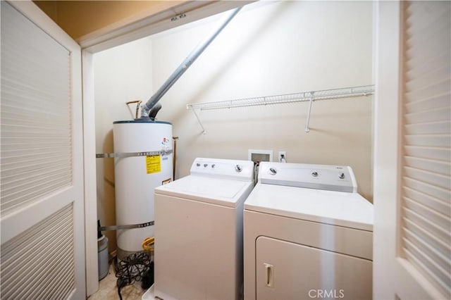 27518 Hazelhurst St Unit 1, Murrieta, CA 92562 - washroom featuring water heater and separate washer and dryer