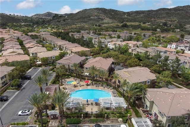 27518 Hazelhurst St Unit 1, Murrieta, CA 92562 - aerial perspective of suburban area with a mountain backdrop and a pool area
