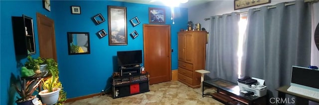 25205 5th Ave, Los Molinos, CA 96055 - living area featuring baseboards and ceiling fan