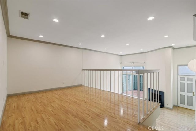 4730 Ben Ave Unit 3, Valley Village, CA 91607 - empty room featuring wood finished floors, visible vents, recessed lighting, and ornamental molding