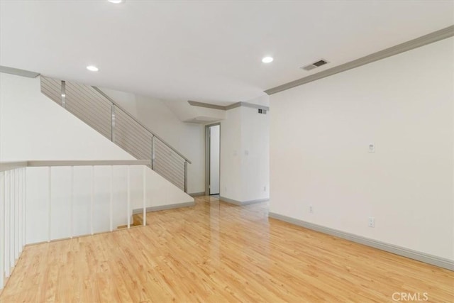 4730 Ben Ave Unit 3, Valley Village, CA 91607 - unfurnished living room with recessed lighting, light wood-type flooring, visible vents, and stairs