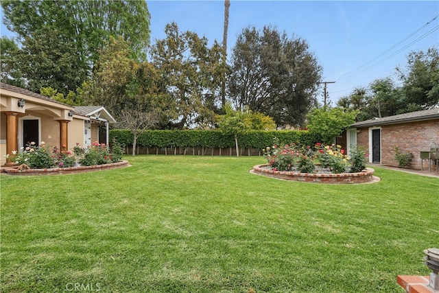 view of yard featuring fence