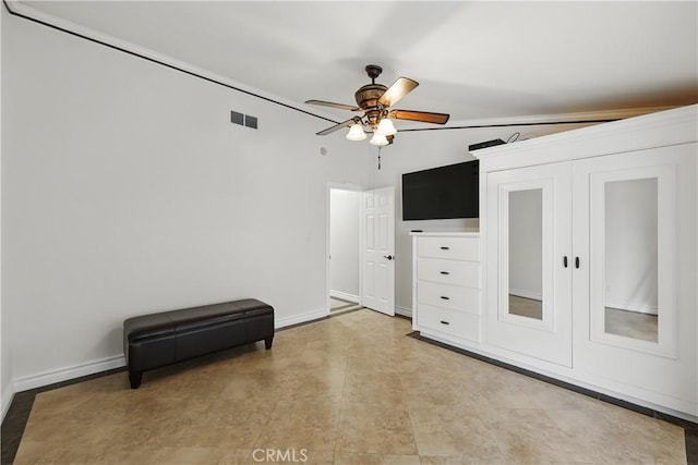 bedroom with visible vents, baseboards, and ceiling fan