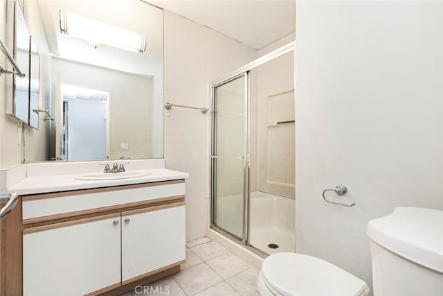 121 Sinclair Ave Unit 122, Glendale, CA 91206 - bathroom featuring vanity, toilet, tile patterned flooring, and a stall shower