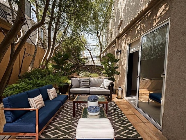 855 Wilcox Ave Unit 103, Los Angeles, CA 90038 - view of patio / terrace featuring outdoor lounge area