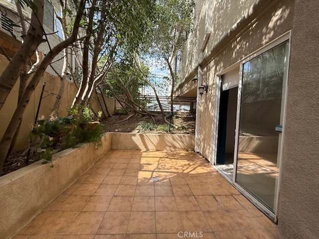 855 Wilcox Ave Unit 103, Los Angeles, CA 90038 - fenced backyard featuring a patio area