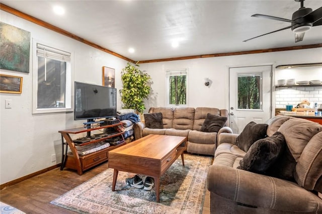 living room featuring recessed lighting, wood finished floors, a ceiling fan, ornamental molding, and baseboards