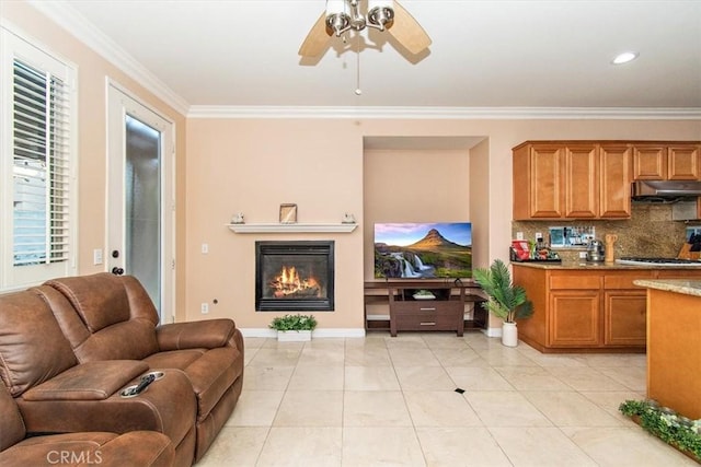 15785 Approach Ave, Chino, CA 91708 - living room with ornamental molding, a glass covered fireplace, and ceiling fan