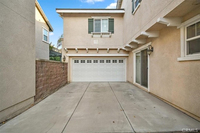 15785 Approach Ave, Chino, CA 91708 - view of front of property with stucco siding, a garage, and concrete driveway