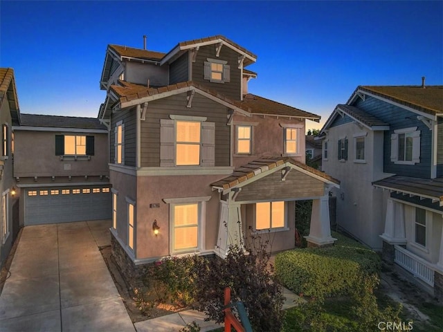 15785 Approach Ave, Chino, CA 91708 - view of front of house with a garage, concrete driveway, and stucco siding