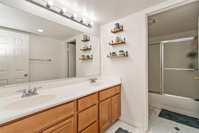 15785 Approach Ave, Chino, CA 91708 - bathroom with shower / bath combination with glass door, tile patterned flooring, a sink, and double vanity
