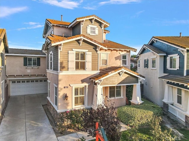 15785 Approach Ave, Chino, CA 91708 - view of front of property featuring a garage, driveway, stucco siding, and a tile roof