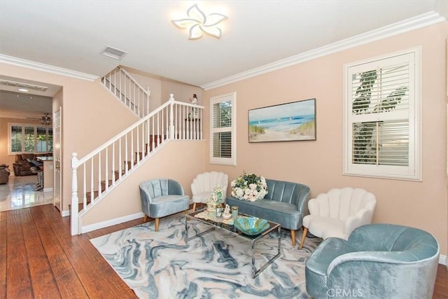 15785 Approach Ave, Chino, CA 91708 - living area with wood-type flooring, visible vents, crown molding, and stairs