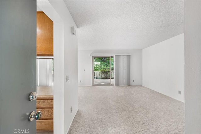 254 Sequoia Ct Unit 12, Thousand Oaks, CA 91360 - empty room with carpet floors and a textured ceiling