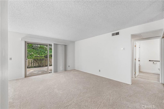254 Sequoia Ct Unit 12, Thousand Oaks, CA 91360 - spare room featuring visible vents, carpet, and a textured ceiling