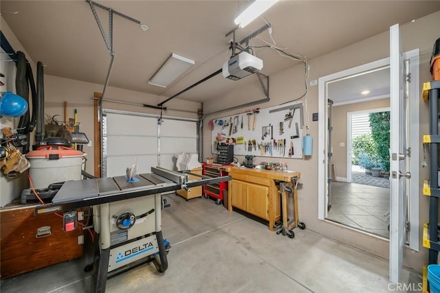1339 Higuera St, San Luis Obispo, CA 93401 - garage with a workshop area and a garage door opener