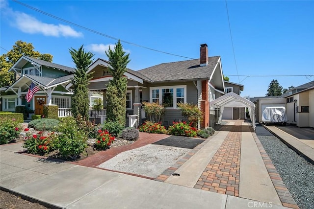 1339 Higuera St, San Luis Obispo, CA 93401 - view of front of house featuring a garage, a shingled roof, and a chimney
