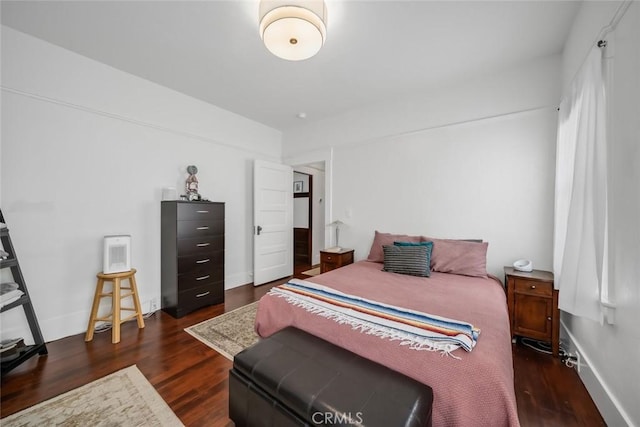 1339 Higuera St, San Luis Obispo, CA 93401 - bedroom featuring baseboards and dark wood-type flooring
