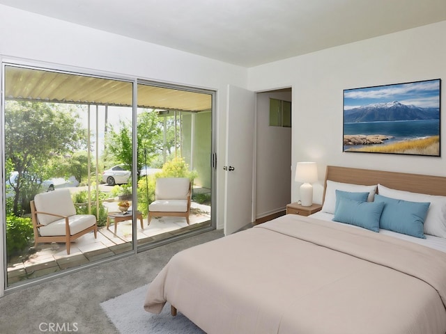 bedroom with carpet floors and access to outside