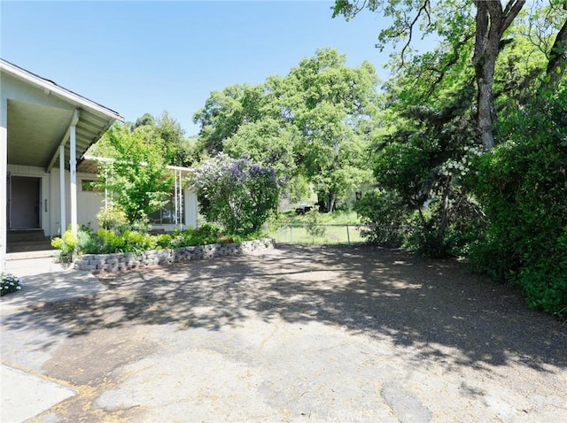 view of yard featuring fence