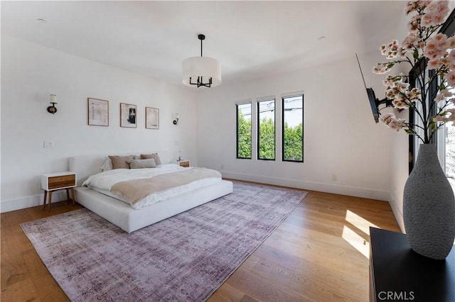 5142 Brynhurst Ave, Los Angeles, CA 90043 - bedroom with wood finished floors and baseboards