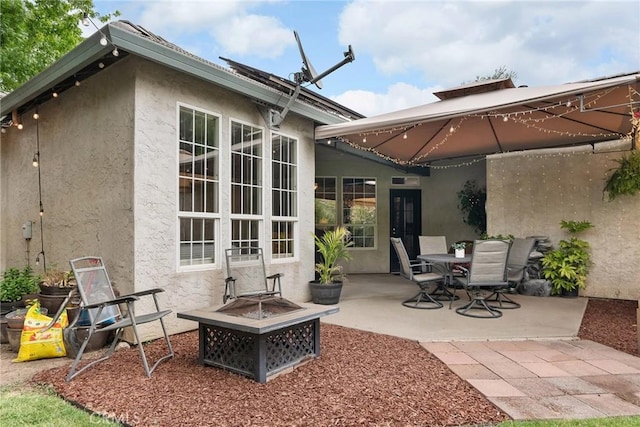 226 Stony Creek Dr, Orland, CA 95963 - view of patio featuring a fire pit