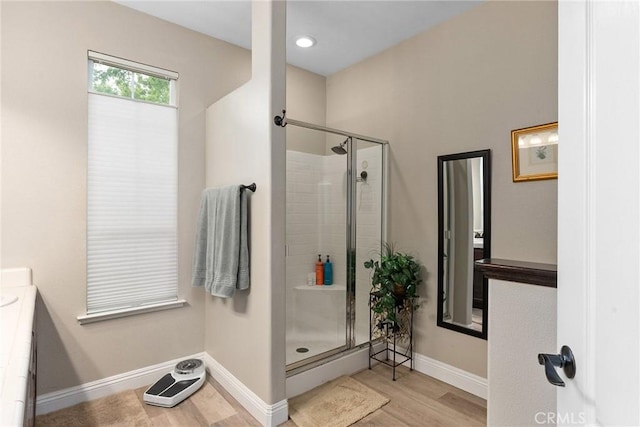226 Stony Creek Dr, Orland, CA 95963 - bathroom with vanity, baseboards, a stall shower, and wood finished floors