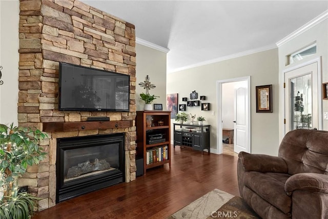 226 Stony Creek Dr, Orland, CA 95963 - living room featuring crown molding, baseboards, dark wood-style flooring, and a stone fireplace