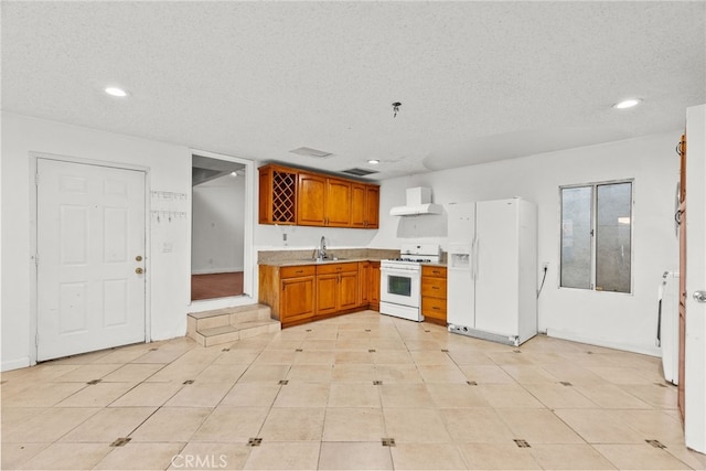 15430 Parthenia St, North Hills, CA 91343 - kitchen featuring extractor fan, a textured ceiling, a sink, and white appliances