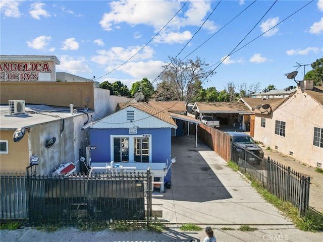 15430 Parthenia St, North Hills, CA 91343 - view of front facade with stucco siding, a fenced front yard, and concrete driveway