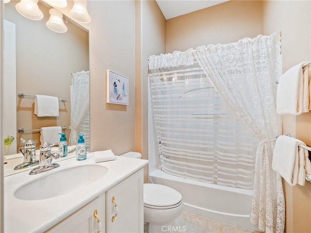 full bathroom with toilet, vanity, tile patterned floors, and shower / bath combo with shower curtain