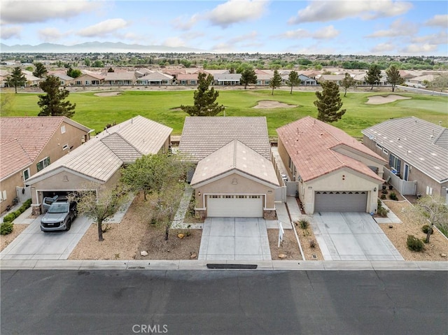 birds eye view of property featuring a residential view and view of golf course