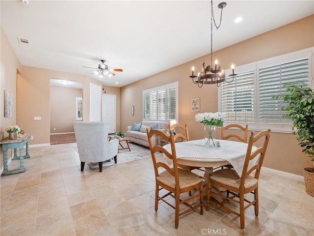 dining space with visible vents, baseboards, and light tile patterned floors