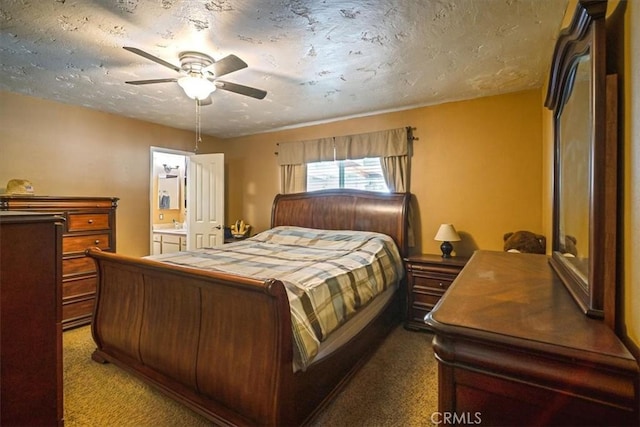 carpeted bedroom with connected bathroom, a textured ceiling, and ceiling fan