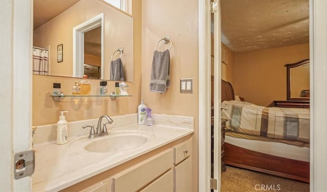 bathroom featuring connected bathroom and vanity