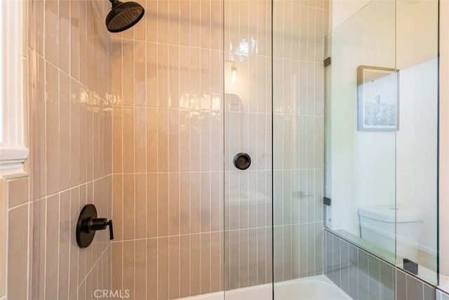 bathroom featuring a washtub and tiled shower