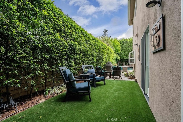 12843 Sarah St, Studio City, CA 91604 - view of green lawn featuring a patio area