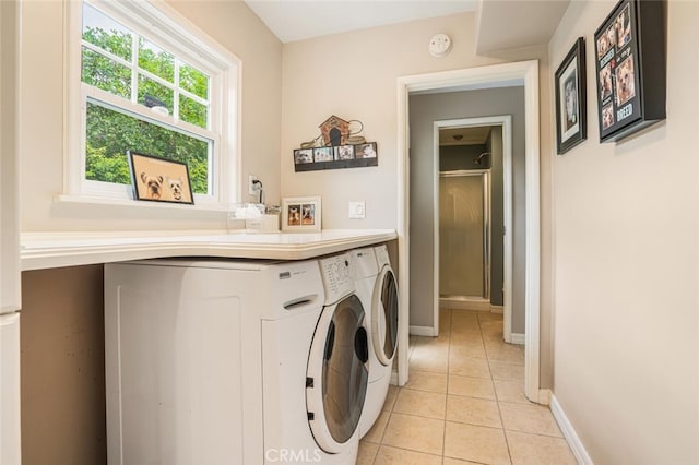 12843 Sarah St, Studio City, CA 91604 - laundry area with washer and dryer and light tile patterned floors