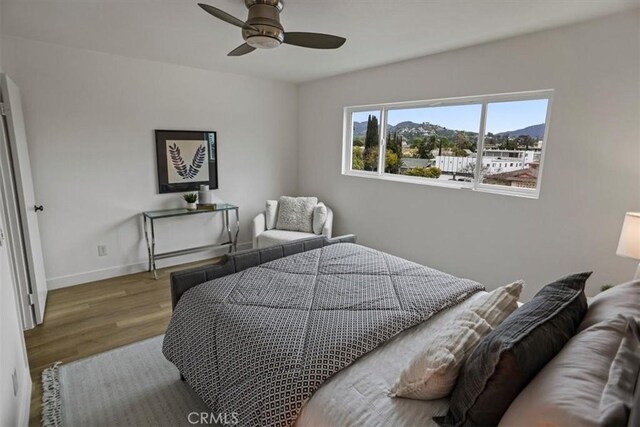 310 N Jackson St Unit 330, Glendale, CA 91206 - bedroom with baseboards, wood finished floors, and ceiling fan