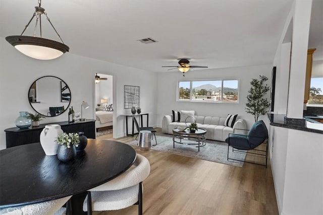 310 N Jackson St Unit 330, Glendale, CA 91206 - dining area featuring light wood finished floors, baseboards, a ceiling fan, and visible vents