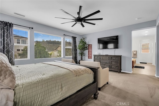 25889 Basil Ct, Corona, CA 92883 - bedroom with carpet, baseboards, ceiling fan, and ensuite bath
